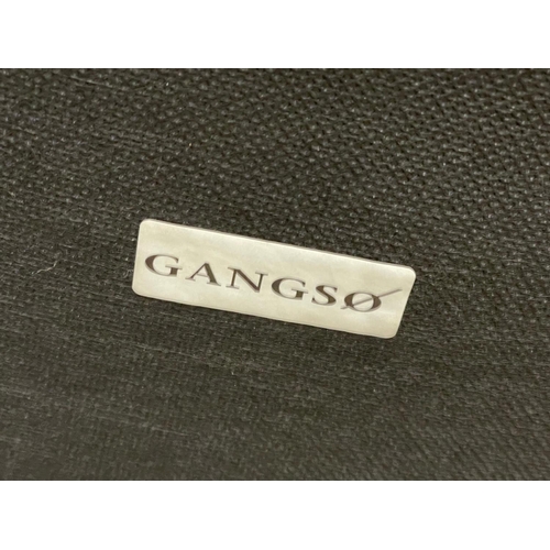 1076 - A pair of Danish leather and chrome armchairs by Gangso.