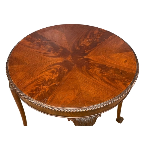 1078 - A good quality early 20th century Chippendale Revival mahogany window table on Ball & Claw feet. Cir... 