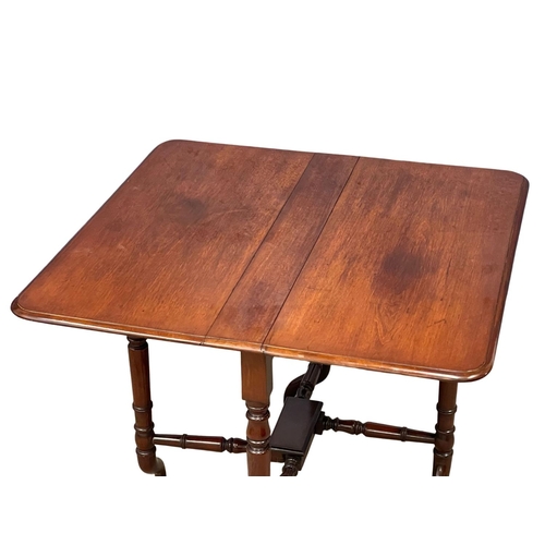 1080 - A large good quality Edwardian mahogany Sutherland table. Open 90x89x71cm