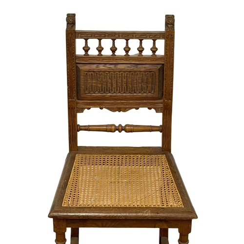 1082 - A late 19th century oak side chair with bergere seat. Circa 1890.