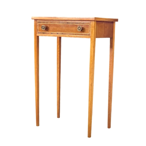 1084 - A vintage Sheraton Revival inlaid mahogany side table with drawer. 49x32x76cm