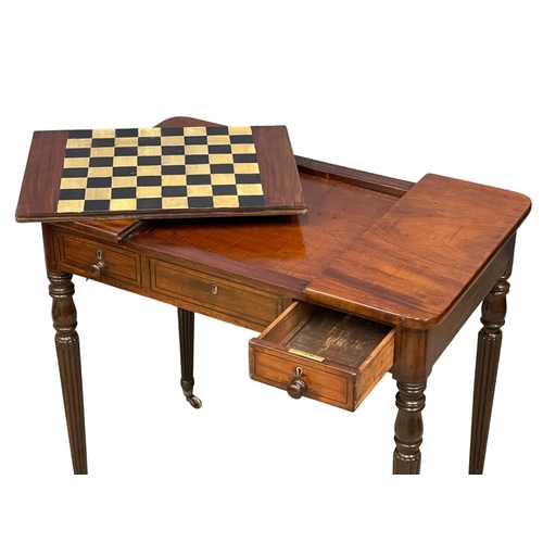 1088 - A George IV mahogany games side table with drawer, on brass cup casters. In the manner of Gillows. C... 