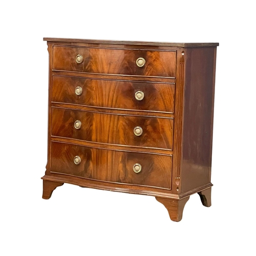 1098 - A fine proportioned Georgian style inlaid mahogany serpentine front chest of drawers. 80x45x85cm