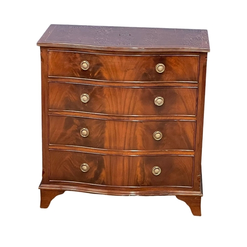 1098 - A fine proportioned Georgian style inlaid mahogany serpentine front chest of drawers. 80x45x85cm