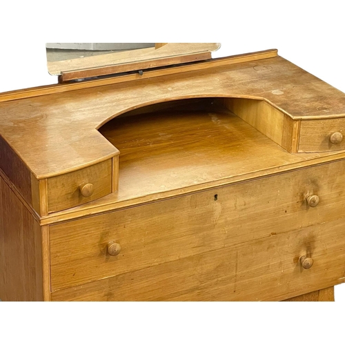 1002 - A G-Plan Mid Century oak dressing chest.  92x46x147cm