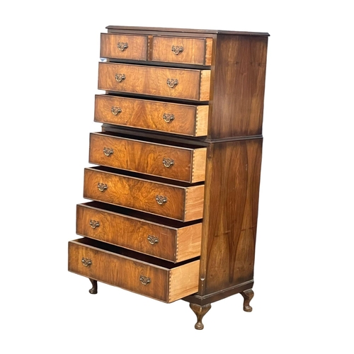 1023 - A vintage Georgian style walnut tallboy chest of drawers.  82x48x150cm