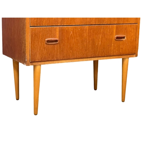 1025 - A Swedish 1960's Mid Century teak chest of drawers.  79x42x103cm