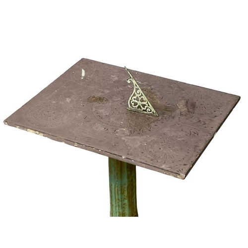 1029 - A 19th century cast iron based sundial with slate top.  Inscribed James McMeekan, 1842.  51x40x71cm