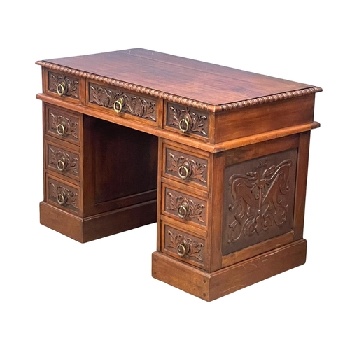 1034 - A good quality Edwardian carved walnut 3pc desk, stamped G.M.G 1915.  110x58x75cm