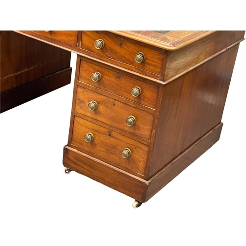 1047 - A large early 19th century Georgian mahogany pedestal desk with leather top, circa 1820-1830.  154x8... 