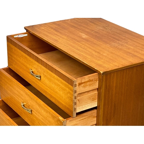 1051 - A 1960's Mid Century teak chest of drawers by Remploy.  64x42x92.5cm