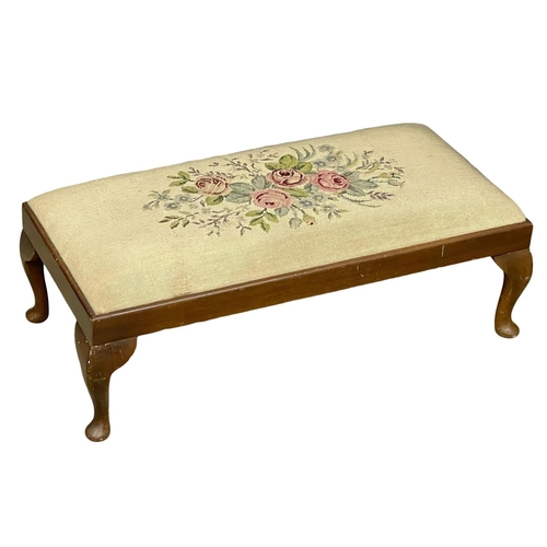 1055 - A long vintage mahogany framed stool with a tapestry top.  88x41x31cm