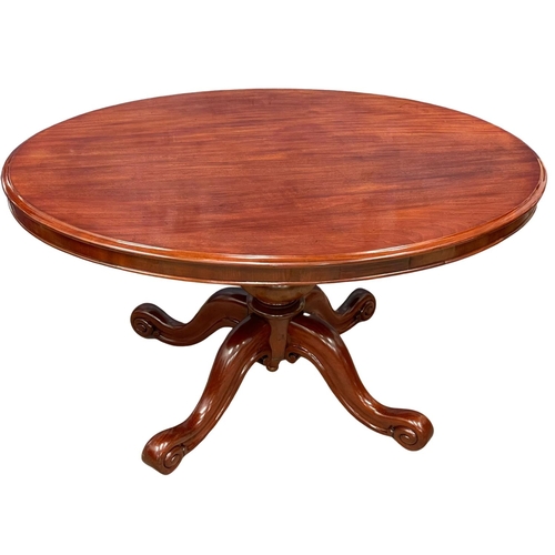 1061 - A Victorian mahogany pedestal breakfast table.  137x96x74cm