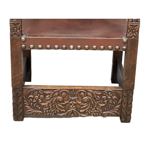 1066 - A large late 19th century Continental carved oak Throne chair, circa 1880