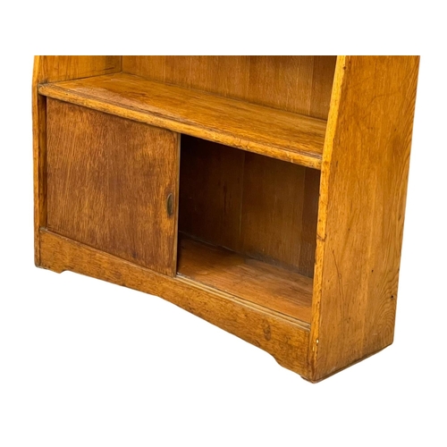 1067 - A Herbert Gibbs Mid Century oak open bookcase.  89x28x113.5cm