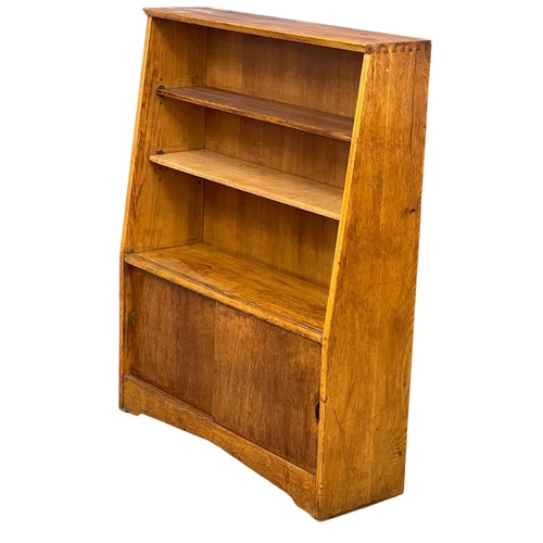 1067 - A Herbert Gibbs Mid Century oak open bookcase.  89x28x113.5cm