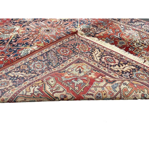 1071 - A large vintage Middle Eastern style Heriz Kadjar rug.  299x201cm