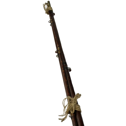 764 - A large Victorian fishing rod.