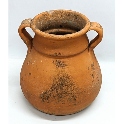 260E - A terracotta 2 handled pot.