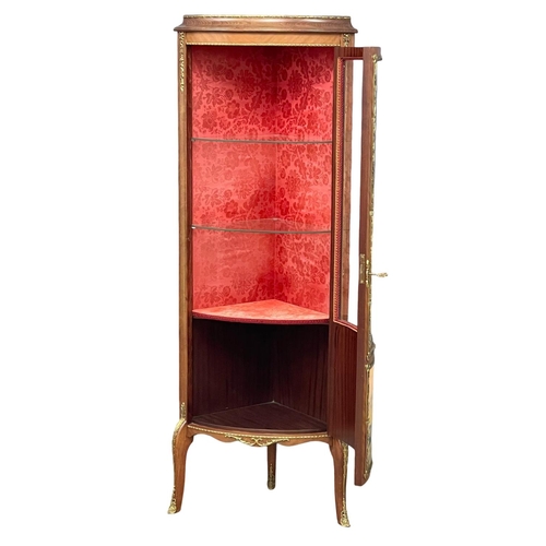 904 - An 18th century style French corner vitrine with brass mounts.  59x39x159cm