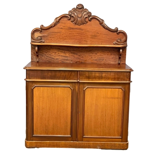 1101 - A Victorian mahogany chiffonier with 2 drawers. 129x50x172cm