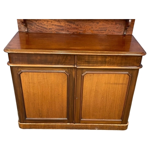 1101 - A Victorian mahogany chiffonier with 2 drawers. 129x50x172cm