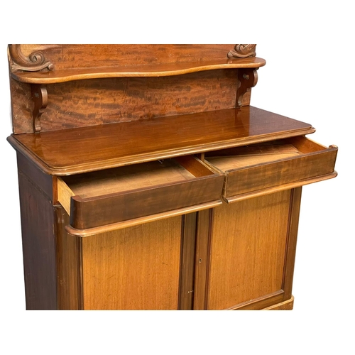 1101 - A Victorian mahogany chiffonier with 2 drawers. 129x50x172cm