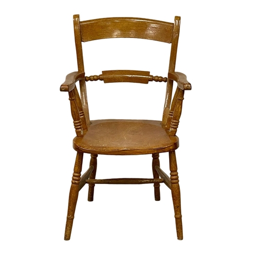 1105 - A Victorian kitchen chair with original scumble paint.