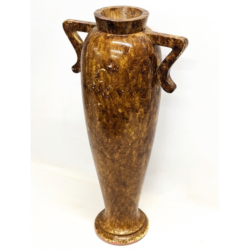 780X - A large early 20th century wooden vase. 70cm