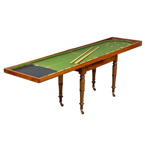 1094 - A Victorian mahogany Bagatelle table.