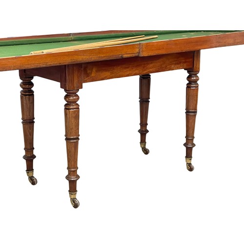 1094 - A Victorian mahogany Bagatelle table.