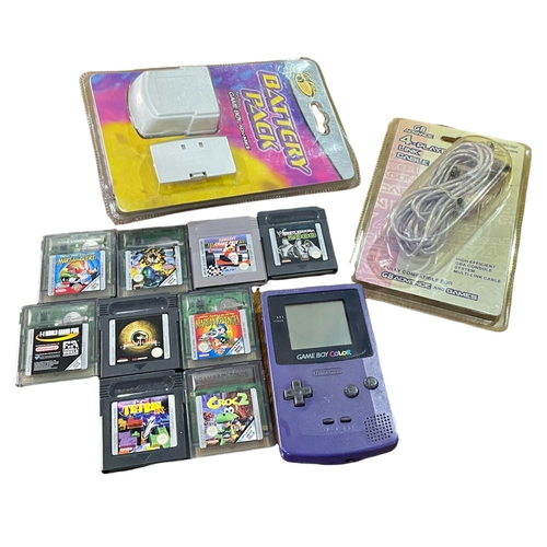 246A - A Game Boy, with games and accessories