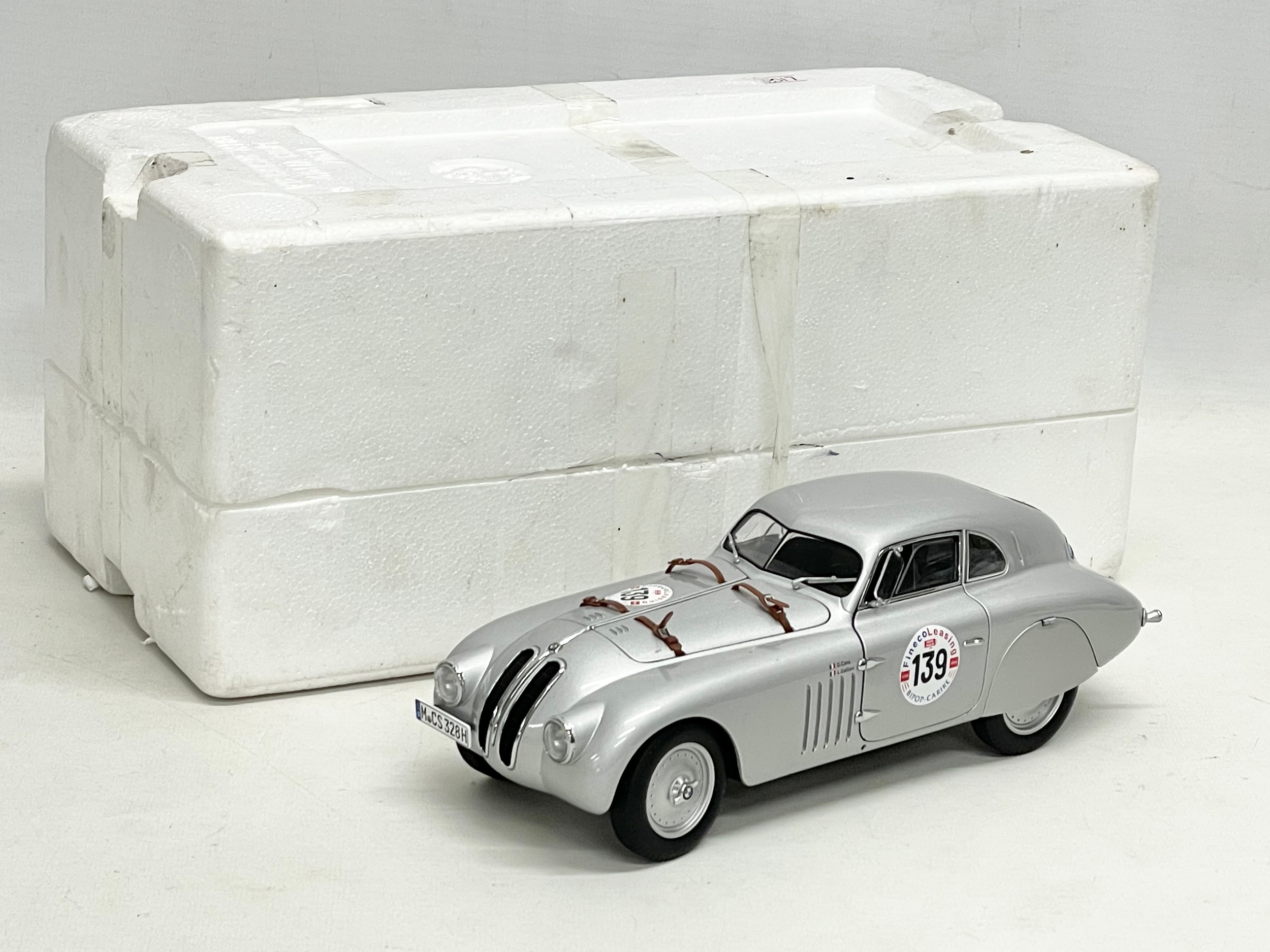 An Autoart BMW 328 Mille Miglia Coupe. Car measures 23cm