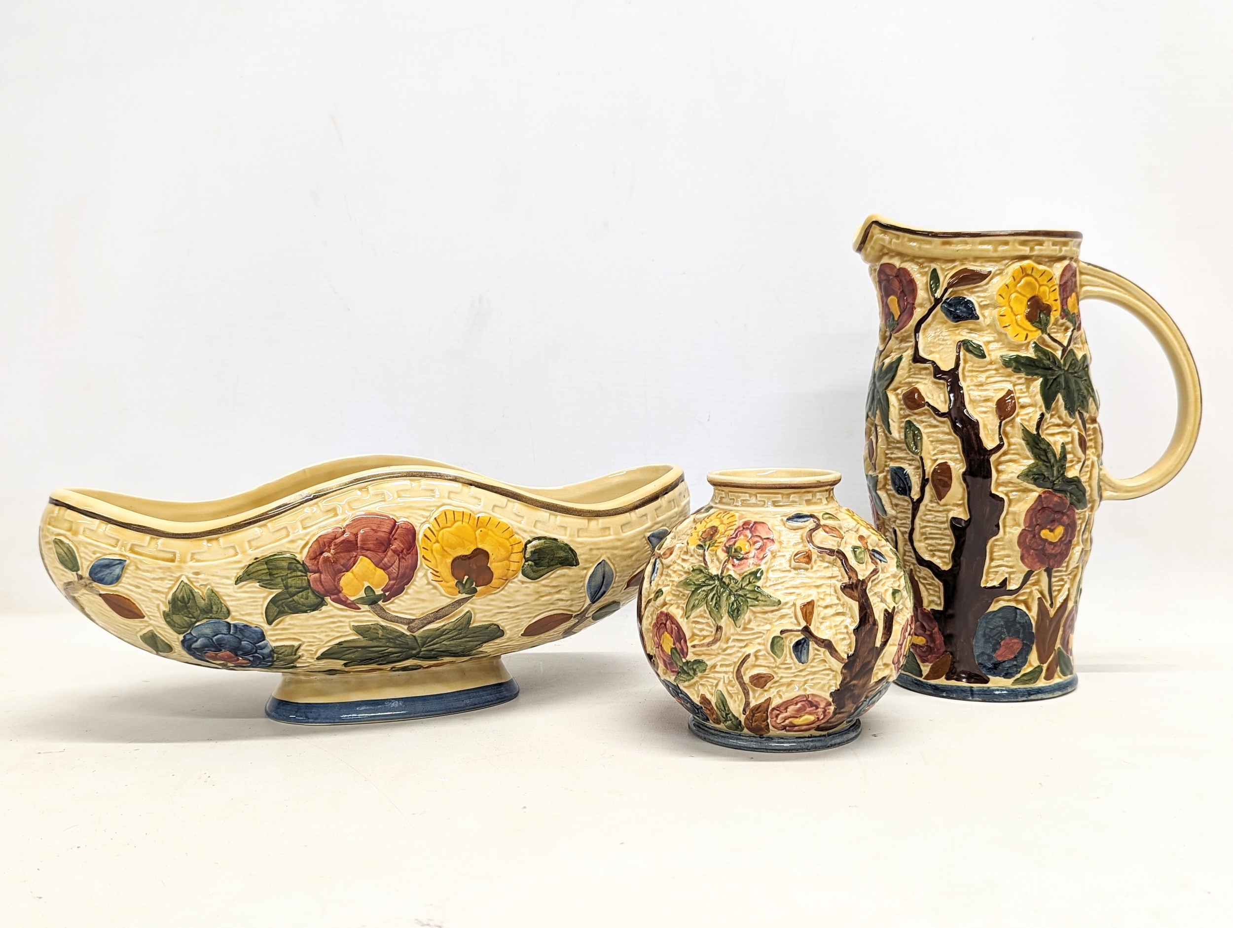 3 hand painted pieces of H. J. Wood 'Indian Tree' pottery, including jug,  vase, and jardinière. Jug