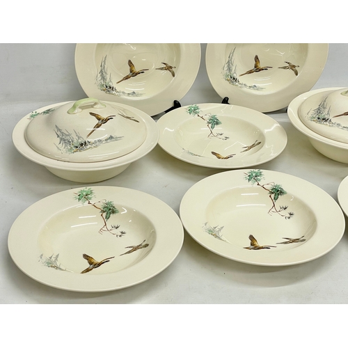 797 - A Royal Doulton ‘Cappice’ part dinner set. A pair of tureens and 6 soup bowls.