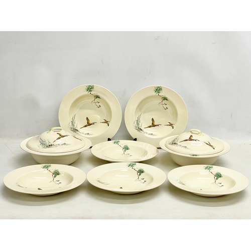 797 - A Royal Doulton ‘Cappice’ part dinner set. A pair of tureens and 6 soup bowls.