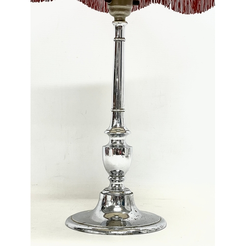 3 - A 1930’s Art Deco chrome table lamp with shade. Base measures 32cm without shade.