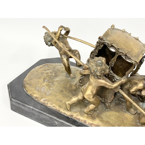 2 - A large early 20th century ornate brass French Putti and carriage figure on marble base. In the mann... 