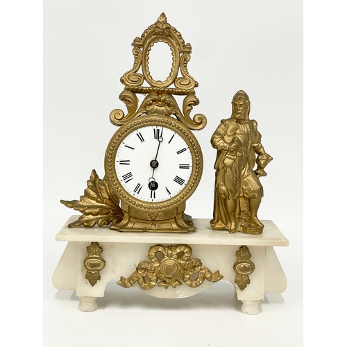 5 - A late 19th century French brass and onyx clock set. Clock measures 25x10x31cm. Candelabras 38.5cm.