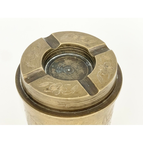 9 - A vintage brass tobacco jar and ashtray. 10cm