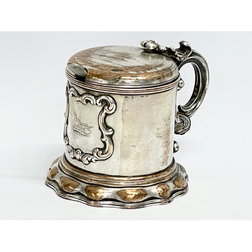 14 - A 19th century ornate silver plated mustard pot with original Bristol Blue liner. 10x8x7cm