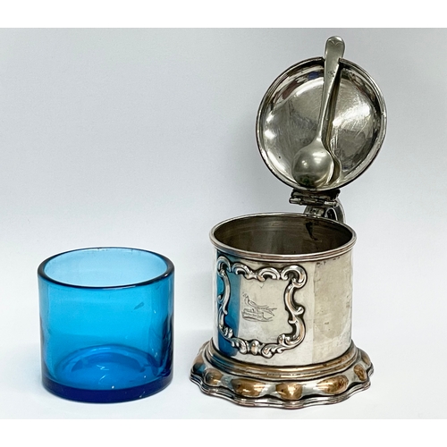 14 - A 19th century ornate silver plated mustard pot with original Bristol Blue liner. 10x8x7cm