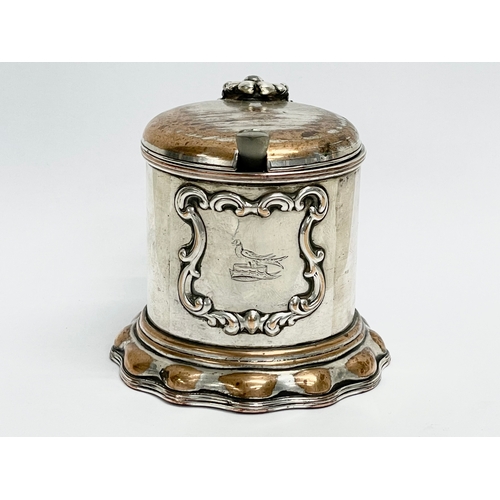 14 - A 19th century ornate silver plated mustard pot with original Bristol Blue liner. 10x8x7cm