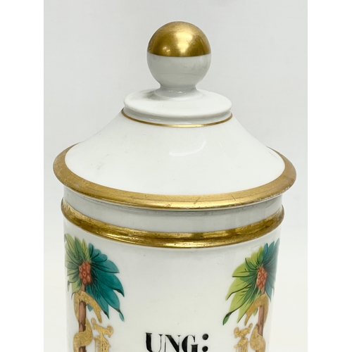 16 - A 19th century French porcelain Apothecary jar and lid. 20.5cm