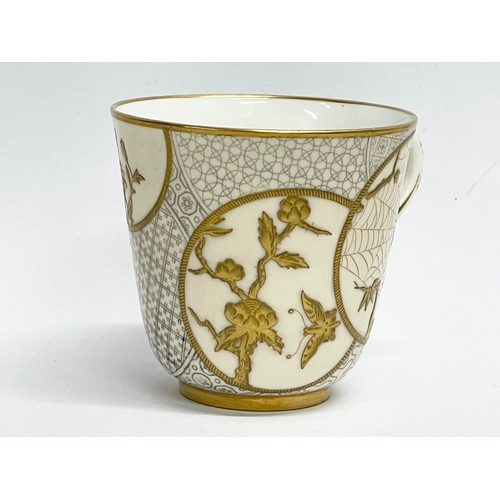 39 - A rare late 19th century Royal Worcester gilt porcelain cup and saucer. Decorated with spiders, cran... 