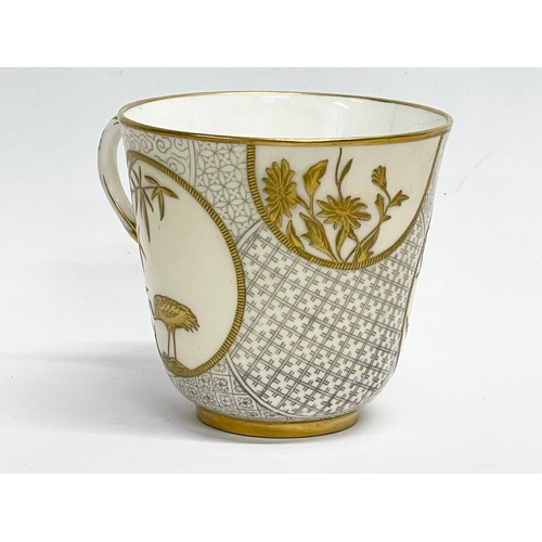 39 - A rare late 19th century Royal Worcester gilt porcelain cup and saucer. Decorated with spiders, cran... 