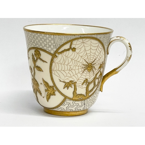 39 - A rare late 19th century Royal Worcester gilt porcelain cup and saucer. Decorated with spiders, cran... 