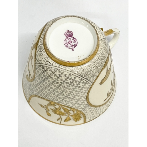 39 - A rare late 19th century Royal Worcester gilt porcelain cup and saucer. Decorated with spiders, cran... 