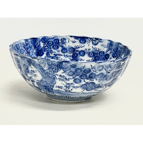 41 - A 19th century Japanese blue and white porcelain bowl on stand. Bowl measures 16x6.5cm