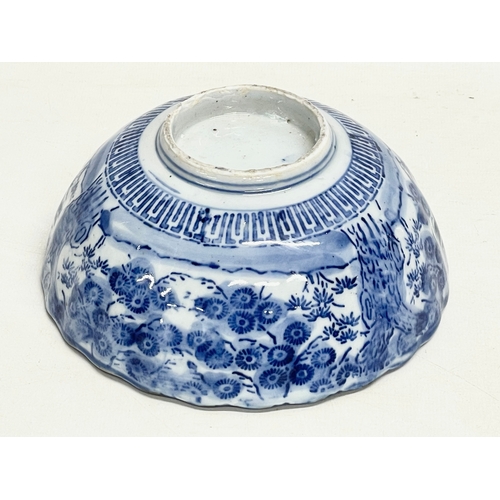 41 - A 19th century Japanese blue and white porcelain bowl on stand. Bowl measures 16x6.5cm